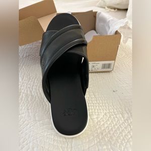 UGG Slides BRAND NEW! Sooo comfortable black slides perfect for the summer!